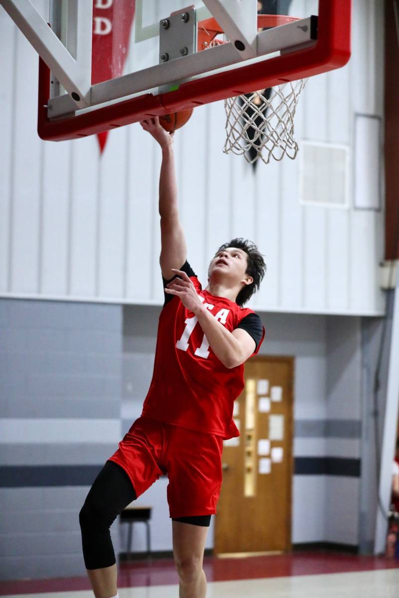 Princeton Christian Academy's Daniel Barnes takes in a layup to clinch Thursday's 39-35 win over Fulton Unity Christian Thursday night at PCA's Howard Hoffman Gym.