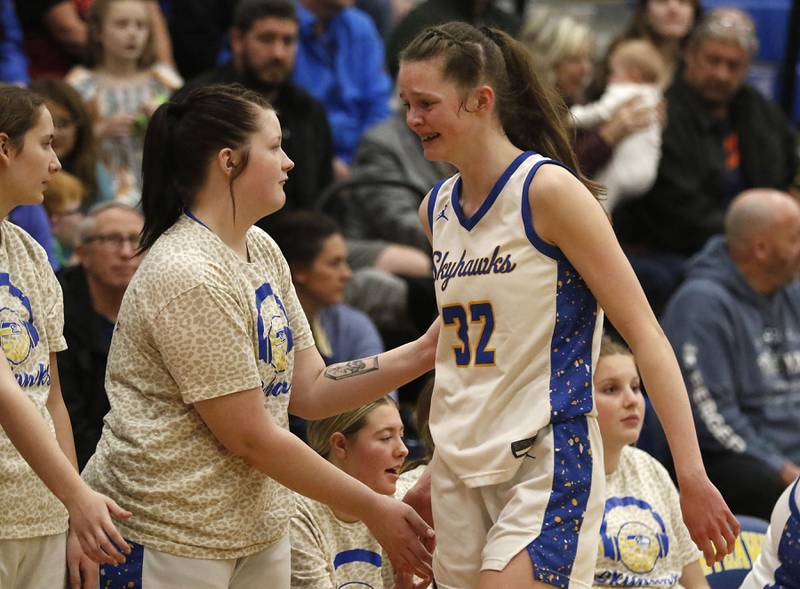 Johnsburg's Skye Toussaint battles he emotions after she came out of the IHSA Class 2A Johnsburg Sectional girls basketball championship game against St. Edward on Thursday, February, 26, 2026, at Johnsburg High School.