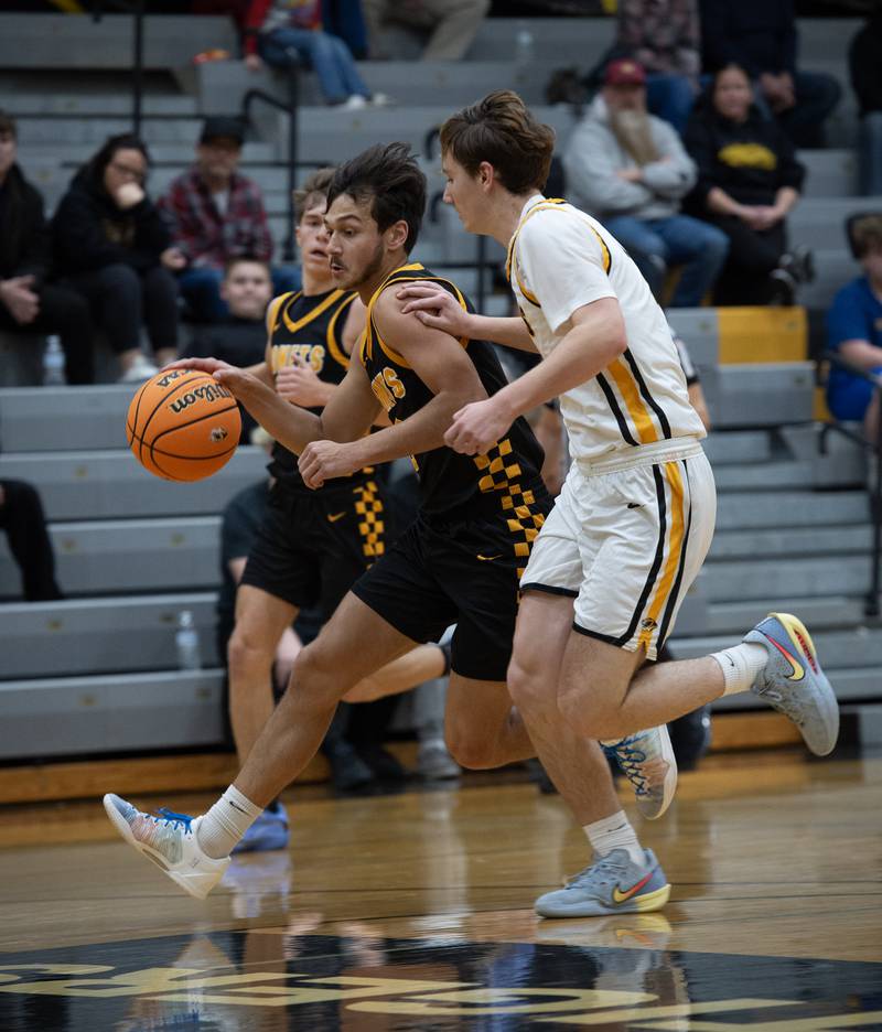 Reed-Custer's Jesse Tresouthick controls the ball as Herscher's Austin Buckley defends in a game on Wednesday, November 26, 2025.