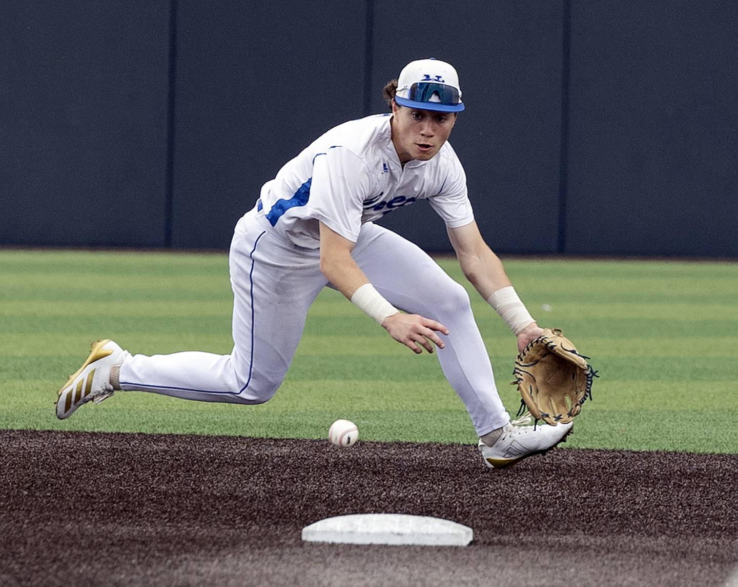 Newman’s Garret Matznick eyes a grounder up the middle against Eureka Saturday, June 7, 2025, during the Class 2A state baseball third place game at Illinois Field in Champaign.