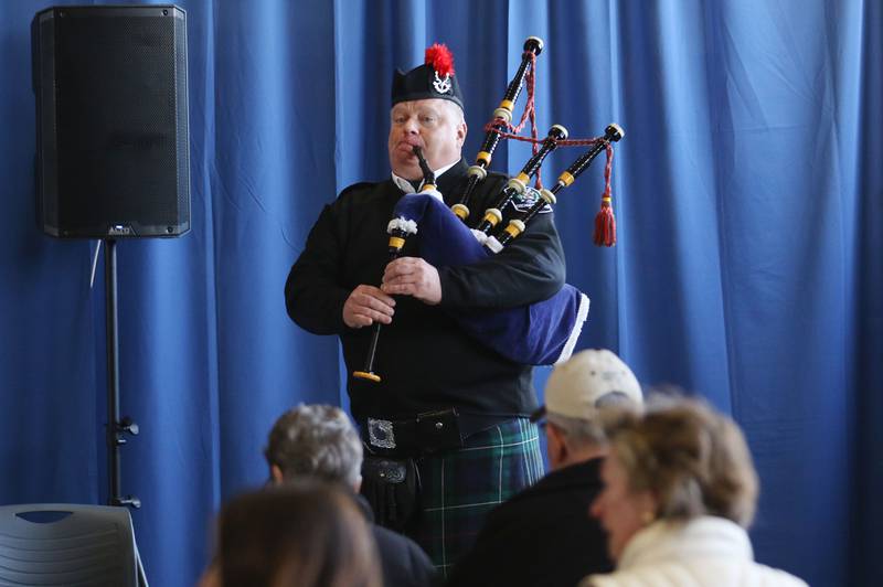 James Melnychuk, of Norridge, with the Chicago Highland Rifles Honor Guard, plays ceremonial music on the bagpipes during the Lindenhurst Veterans Day Ceremony at the Public Works garage behind the Village Hall on November 11th in Lindenhurst.
Photo by Candace H. Johnson for Shaw Local News Network