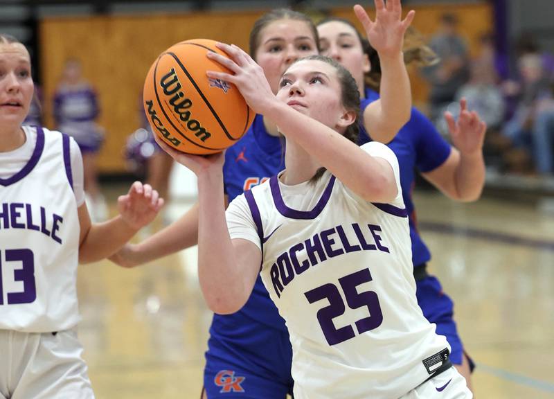 Rochelle's Jaydin Dickey gets to the basket ahead of Genoa-Kingston's Arielle Rich during their game Monday, Dec. 15, 2025, at Rochelle High School.