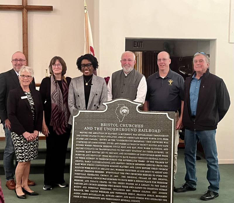 Speakers at the Oct. 24, 2025, unveiling of the Chapel on the Green in Yorkville's new historical marker for its participation in the Underground Railroad. Pictured, State Rep. Jed Davis, R- Yorkville, President of the Chapel Susan Kritzberg, descendant of abolitionist Holy Wheeler Brady and U.S. Rep. Lauren Underwood, D- Naperville. Also pictured, executive director of the Illinois Historical Society Bill Furry, Yorkville mayor John Purcell, and chairman of the Kendall County Historic Preservation Commission Jeff Wehrli.
