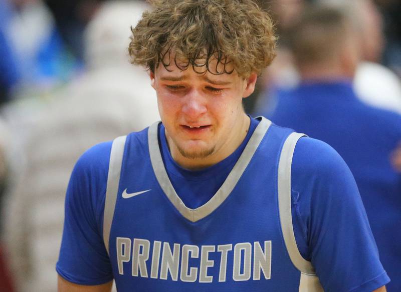 Princeton's Jayden Fulkerson reacts while walking off the floor  after loosing to Rock Falls during the Class 2A Sectional final on Friday, March 7, 2025 at Marengo High School.