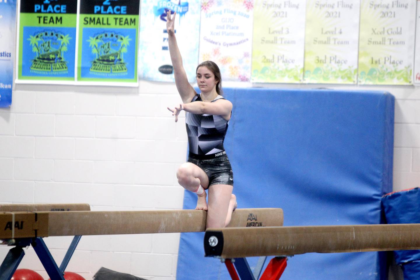 Kaneland senior gymnast Olivia Kerrins works out at the Aurora Turners gym in Aurora on Monday, Jan. 16, 2023. Kerrins has overcome multiple concussions, a severe knee injury and the onset of postural orthostatic tachycardia syndrome (POTS) during her athletic career.