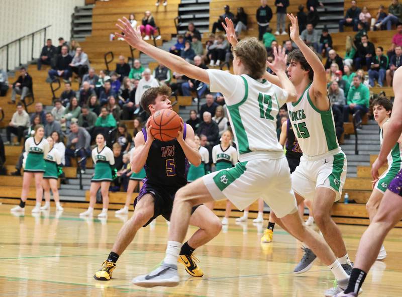 Downers Grove North’s Owen Thulin (5) attempts to get through the York defense during a boys varsity basketball game on Saturday, Feb. 10, 2024 in Elmhurst, IL.