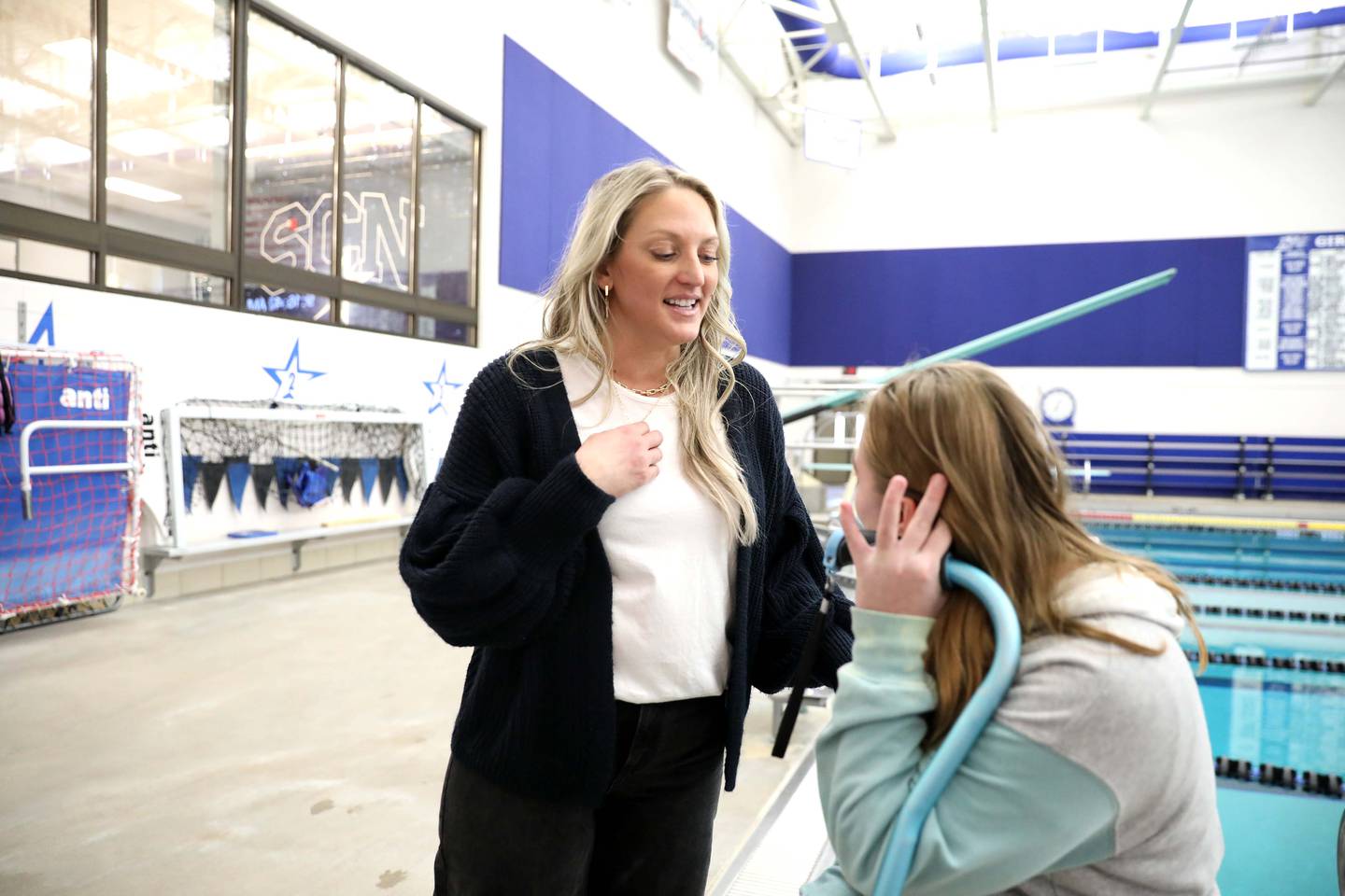 St. Charles North High School Teaching Assistant Adrienne Geiseman stepped in this fall to support student Maya Townsend, who sought to participate in swimming for the very first time. Geiseman provided Maya with direct, unwavering support throughout the season at practices and meets.
