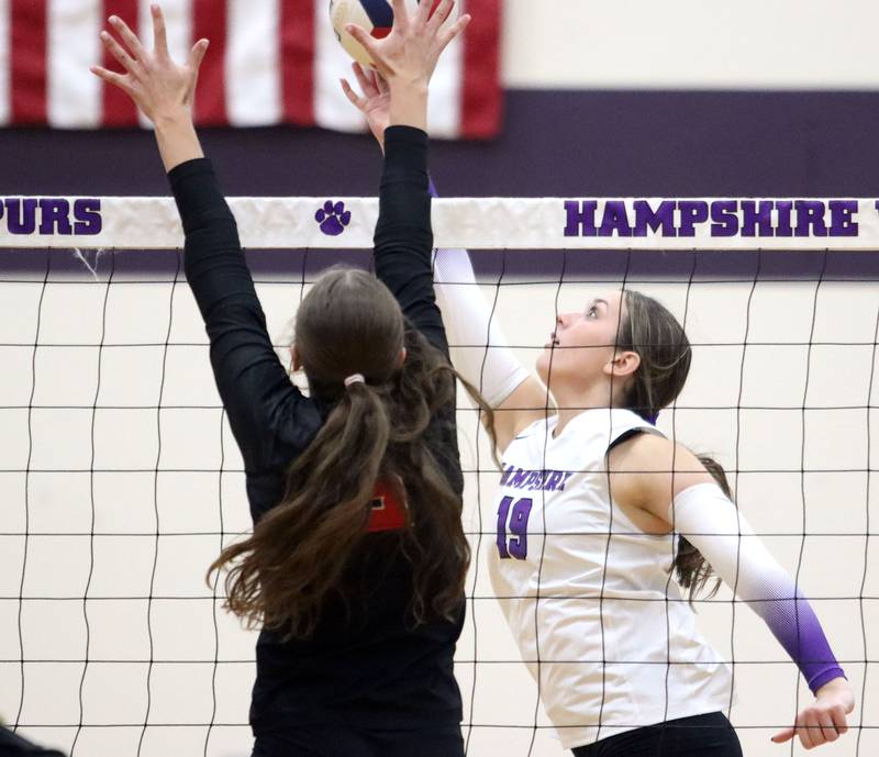 Hampshire’s Katelynn Petterson hits the ball over the net against Huntley in varsity girls volleyball at Hampshire High School in Hampshire on Tuesday, Sept. 23, 2025.
