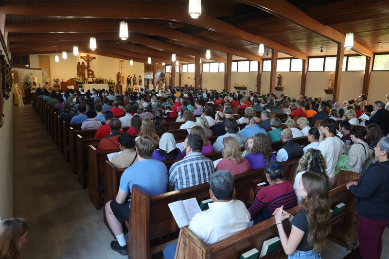 Hundreds gather inside St. John Paul II Catholic Church during the National Eucharistic Pilgrimage stop in Kankakee on Sunday, May 18, 2025.