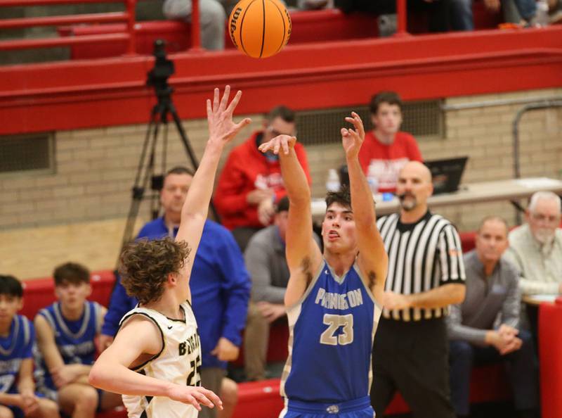 Princeton's Noah LaPorte shoots a jump shot over Oak Forest's Hayden Noha during the Dean Riley Shootin' The Rock Thanksgiving Tournament on Tuesday, Nov. 26, 2024 in Kingman Gym at Ottawa High School.