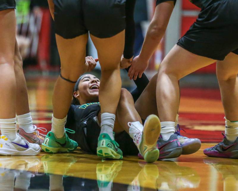 Waubonsie Valley's Arianna Garcia (1) reacts after drawing a charge during their Class 4A Bolingbrook Sectional final basketball game between Waubonsie Valley at Benet. Feb 27, 2025 in Bolingbrook.