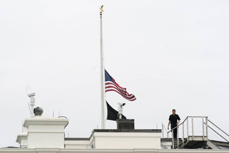 An American flag flies at half-staff at the White House, Tuesday, May 24, 2022, in Washington, to honor the victims of the mass shooting at Robb Elementary School in Uvalde, Texas. (AP Photo/Manuel Balce Ceneta)