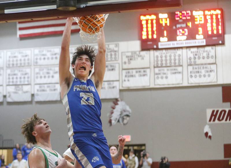 Princeton's Noah LaPorte dunks the ball over Rock Falls's Cole Mulnix late in the fourth quarter during the Class 2A Sectional final on Friday, March 7, 2025 at Marengo High School.