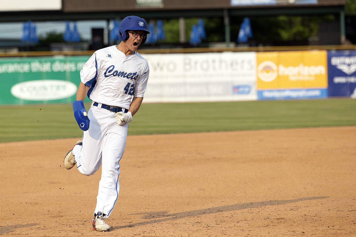 Newman’s Chase Decker celebrates as he rounds the bases on Kelly’s home run against Chicago Hope Monday, June 2, 2025, during the Class 2A Supersectional at Northwestern Medicine Field in Geneva.