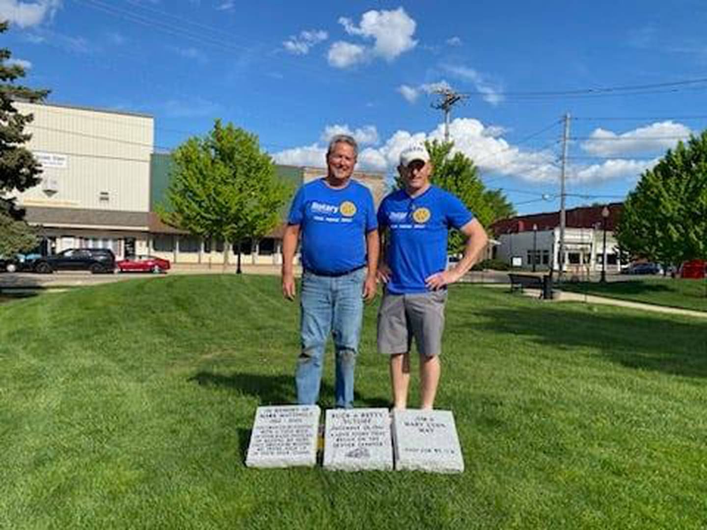 Joe Park (left) and Eric May commemorate the planting of new trees April 30, 2024, at Rotary Park in Princeton.