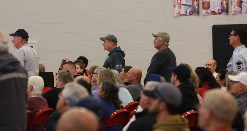 United State Airforce Veterans stand to be recognized during the Veterans Day program on Tuesday, Nov. 11, 2025 at Parkside Middle School in Peru.