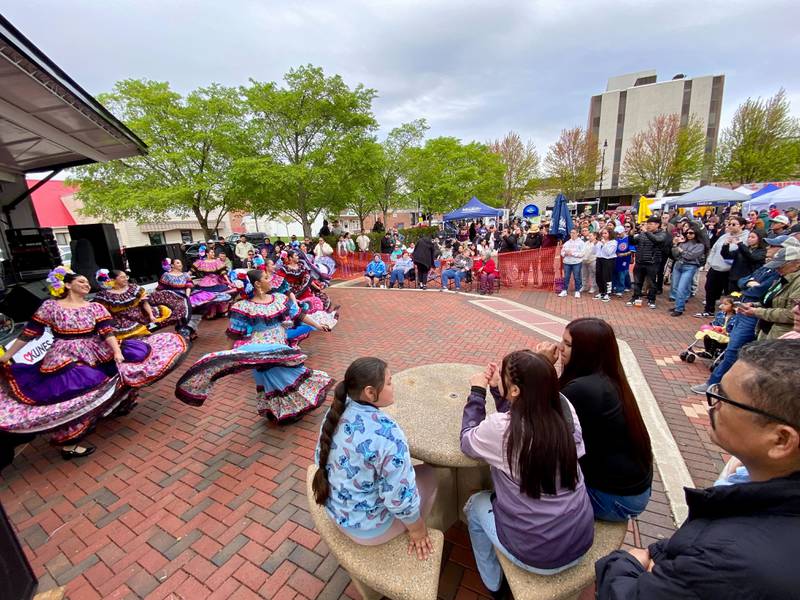 Dancers with Northern Illinois University's Ballet Folklórico Aztlán perform for the crowd on Sunday, May 4, 2025, in the Frank Van Buer Plaza in downtown DeKalb for the city's annual Cinco de Mayo Celebration.