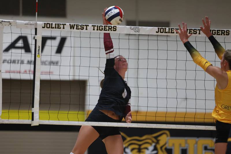 Plainfield North’s Isabelle Davis goes for the kill against Joliet West on Wednesday, Sept. 6, 2023 in Joliet.