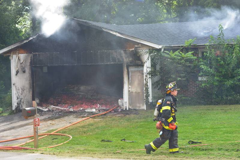Firefighters from five departments responded to a garage fire at 540 E. Elizabeth Road, southeast of Oregon, on Wednesday, Aug. 20, 2025.