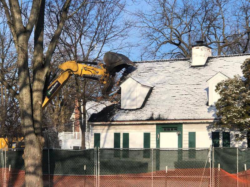 The demolition of the former home of AJ Freund on Dole Avenue began Wednesday morning in Crystal Lake.