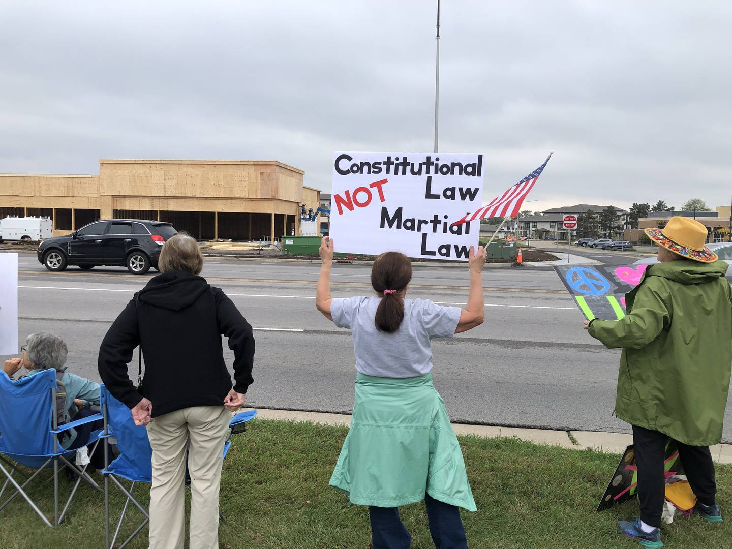 Up to 2,000 were estimated at the No Kings rally Saturday in Crystal Lake, with protesters lining several blocks of Route 14 during the event, part of a national protest.