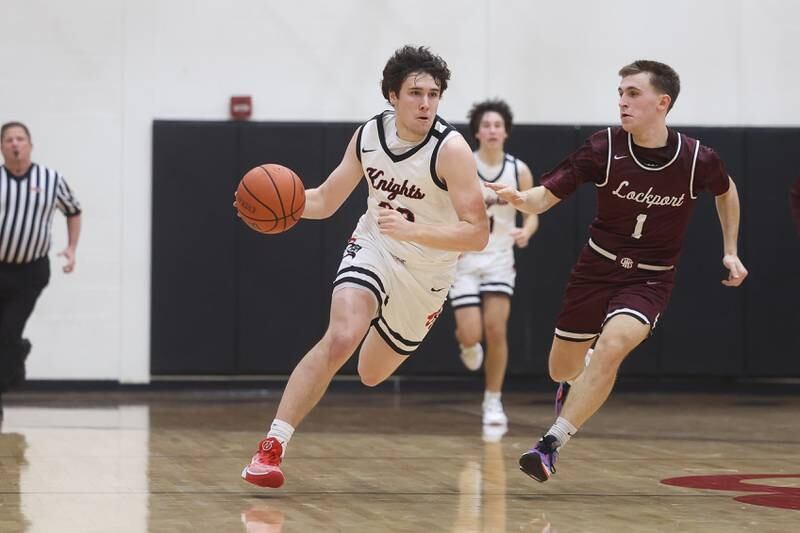 Lincoln-Way Central’s Luke Tingley take the ball upcourt against Lockport on Tuesday, Jan. 23rd, 2024 in New Lenox.