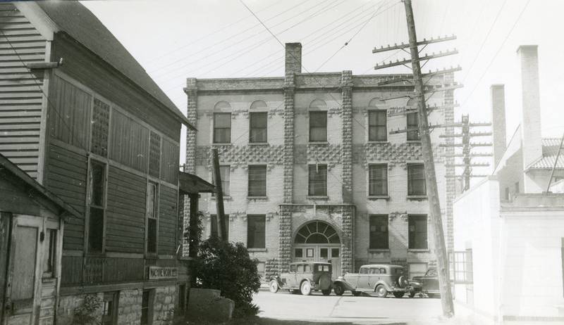The DeKalb Armory building in the 300 block of Locust Street in DeKalb, looking south from the alley in 1944. The building was demolished in September 1969.