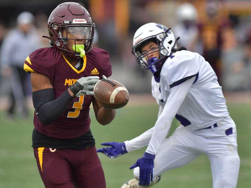 Montini's Josiah James (3) just misses a catch that was swatted away by Wilmington's William Moore during a Class 3A semifinal game on November 23, 2024 at Montini Catholic High School in Lombard.