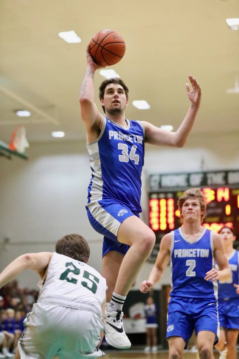 Princeton's Kolten Monroe pulls up ahead of St. Bede's Logan Potthoff for a first-half shot Friday at St. Bede.