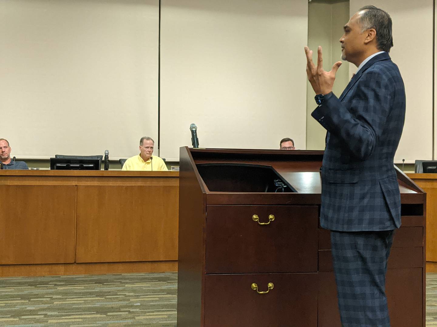 Oswego resident Paresh Patel of Chakra360 LLC addresses the Oswego Planning and Zoning Commission at its Oct. 7 meeting. Patel has submitted plans to build a professional cricket stadium with a clubhouse and restaurant on 33.48 acres at the northwest corner of Orchard Road and Tuscany Trail in Oswego. The land is currently zoned for manufacturing and the proposed stadium would be considered a special use.