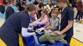GAVC students run checkups on stuffed animals for Nettle Creek Elementary students