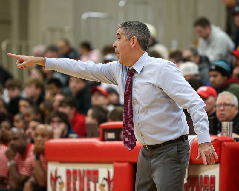 Benet's head coach Gene Heidkamp yells out instructions during their When Sides Collide Shootout basketball tournament matchup between Rich Township at Benet Academy. Jan 25, 2025 in Lisle.