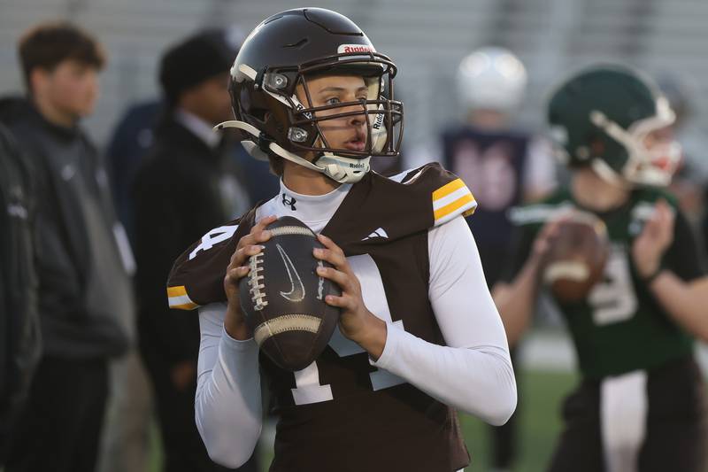 Joliet Catholic’s Liam Huffman looks to pass at the IHSA Southwest Suburb Showcase combine on Thursday, May 7, 2026 at Plainfield North High School.
