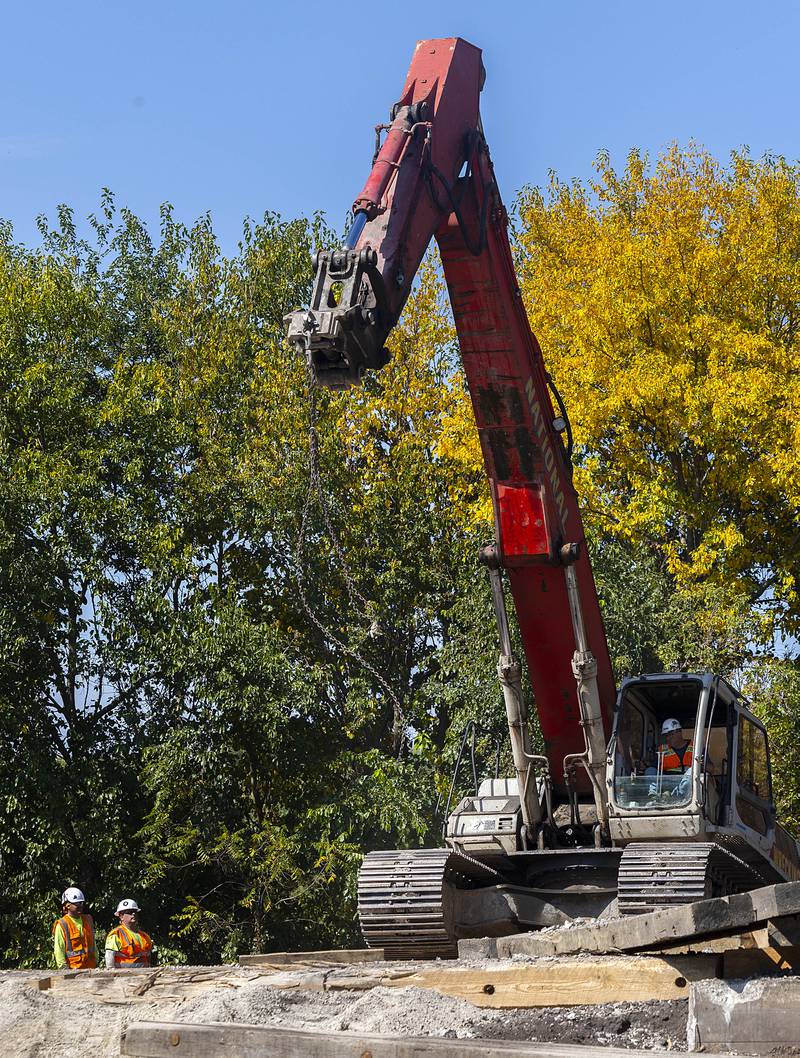 An excavator is moved into place Tuesday, Sept. 16, 2025, in Nelson as an obsolete coal tower is undergoing demolition on the Union Pacific rail line.