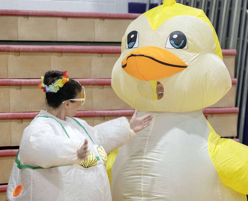 Tonya Yingling (left) and Paige Toms get a little dancing in before their students arrive Wednesday, May 21, 2025, at Reagan Middle School.