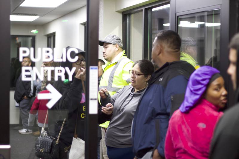 A group of voters stand in line to vote at the Will County Office building on Tuesday Nov. 5, 2024, in Joliet.