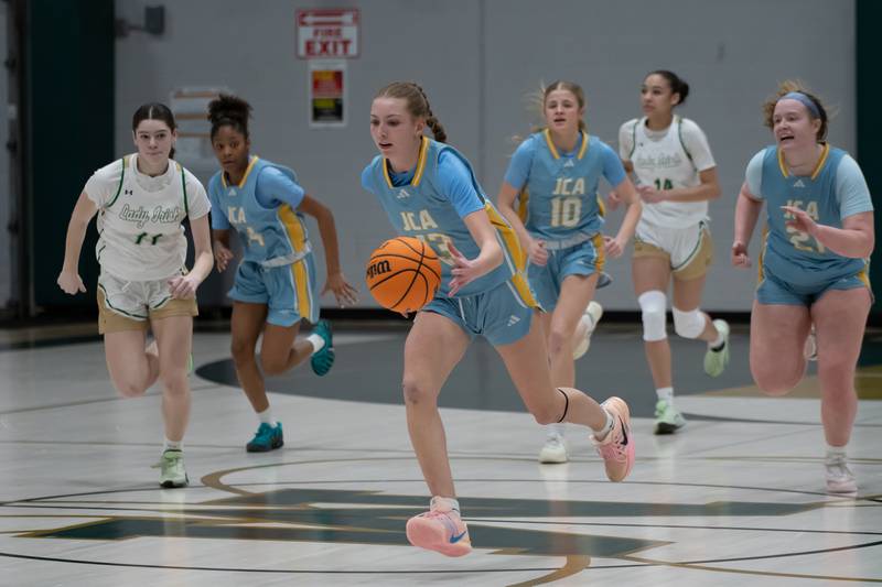 Joliet Catholic's Abby Dulinsky breaks away during their game against Bishop McNamara on Wednesday, Feb. 11, 2026.