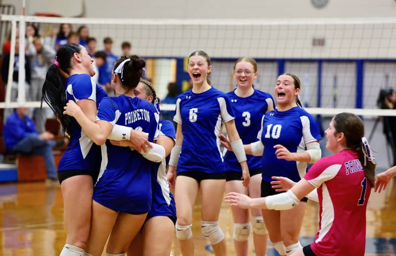 The Princeton Tigresses celebrate their regional championship win over Sterling Newman Thursday night at Prouty Gym.