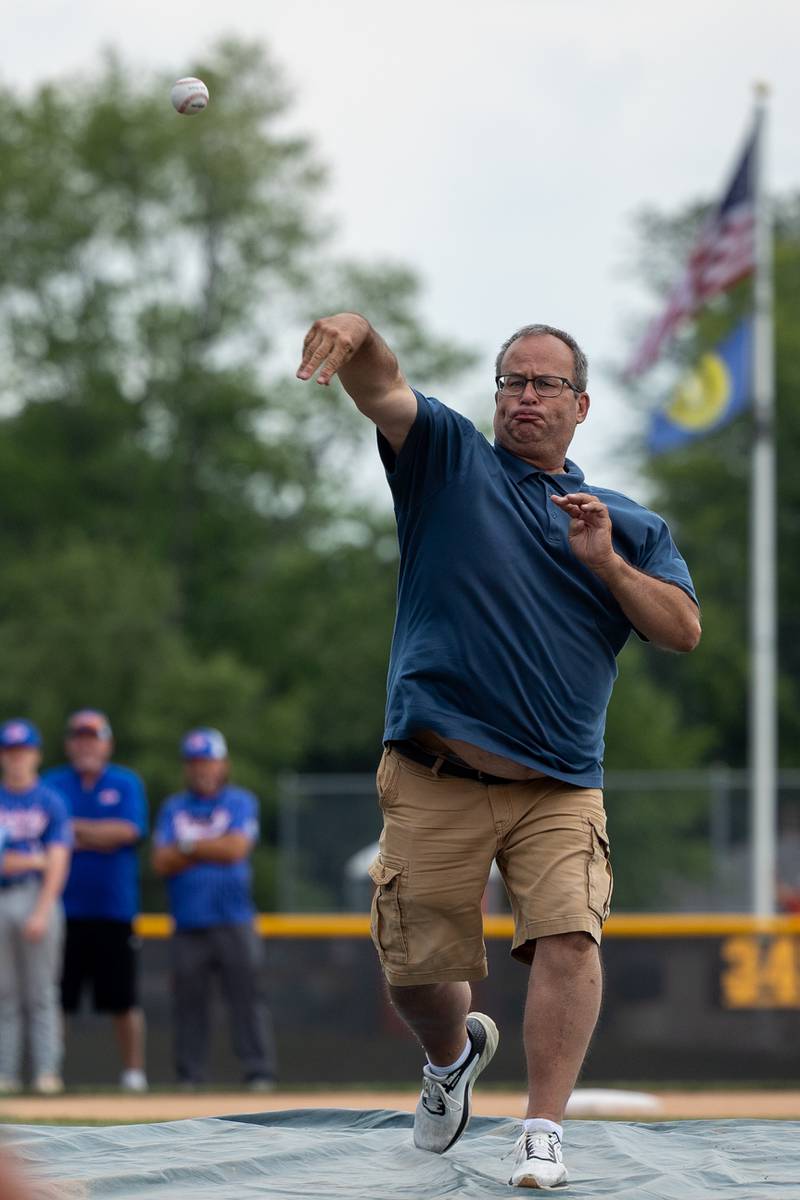 Peru Mayor, Ken Kolowski throws first pitch at the Central Region Tournament, opening Ceremony on Friday, July 11, 2025 at Washington Park in Peru.