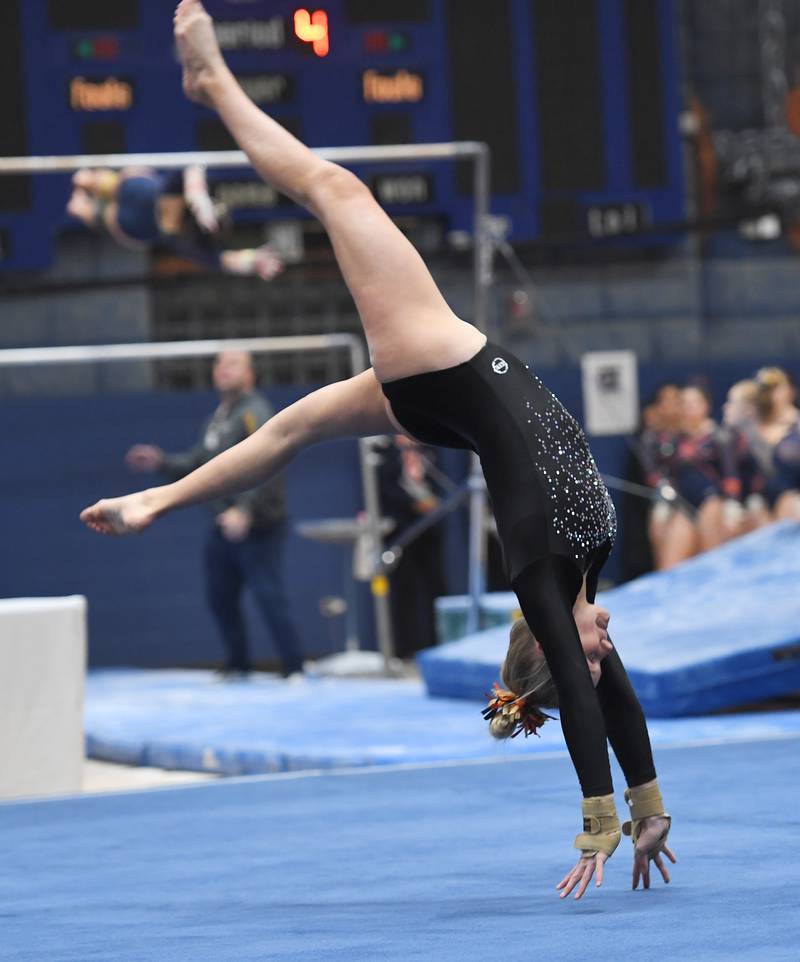 DeKalb’s Leah Benson performs her floor exercise routine at the Lake Park girls gymnastics sectional meet in Roselle on Monday, February 6, 2023.