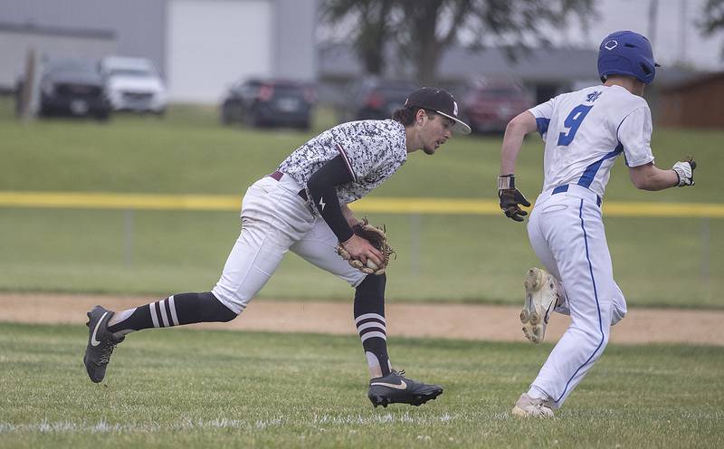 Marengo’s Michael Kirchoff comes off the mound to field a bunt off the bat of Newman’s Joe Oswalt Wednesday, May 28, 2025, in the Class 2A Sectional semifinal in Mendota.