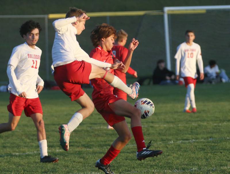 Streator's Kam Darrow kicks the ball away from L-P's Jamie Gonzalez during the Class 2A Regional semifinal game on Monday, Oct. 20, 2025 at Ottawa High School.
