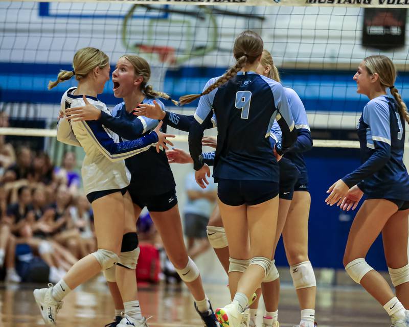Downers Grove South celebrates a point during volleyball match between Downers Grove North at Downers Grove South.  Sept 7, 2023.