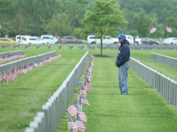 At Abraham Lincoln National Cemetery,  memories one flag at a time