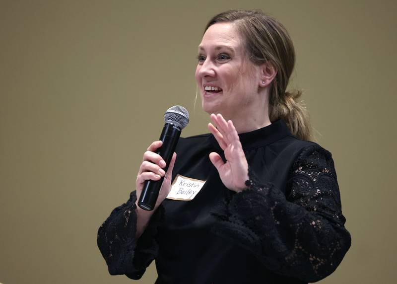District 428 School Board candidate Kristin Bailey speaks Thursday, March 20, 2025, during the DeKalb Area Rental Association and DeKalb Area Builders Association School Board Candidates Forum at Faranda's Banquets in DeKalb.