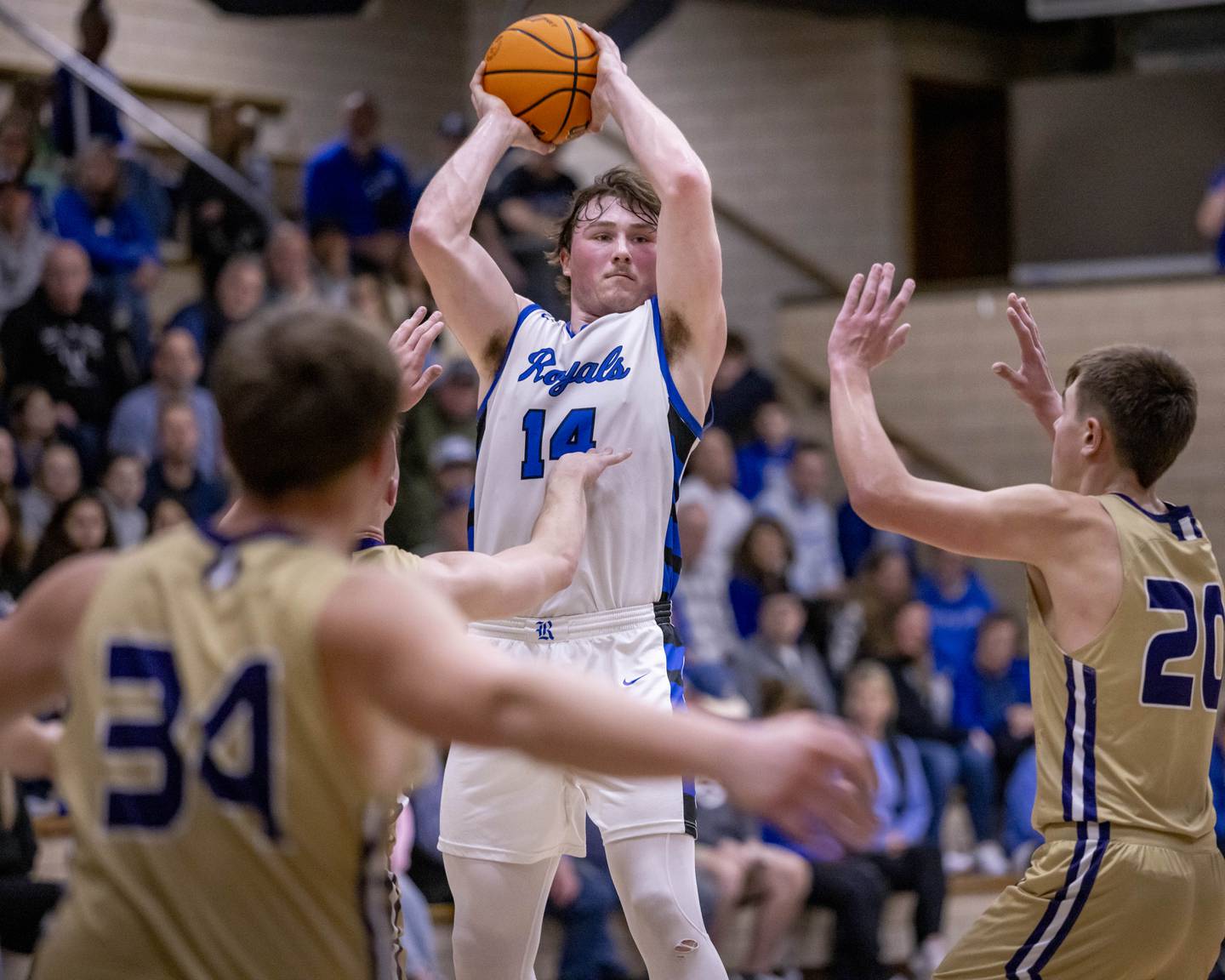 Martin Ledbetter of Hinckley-Big Rock looks for a team mate to pass to during the Class 1A Regional Championship on February 28, 2025 at Bader Gym.