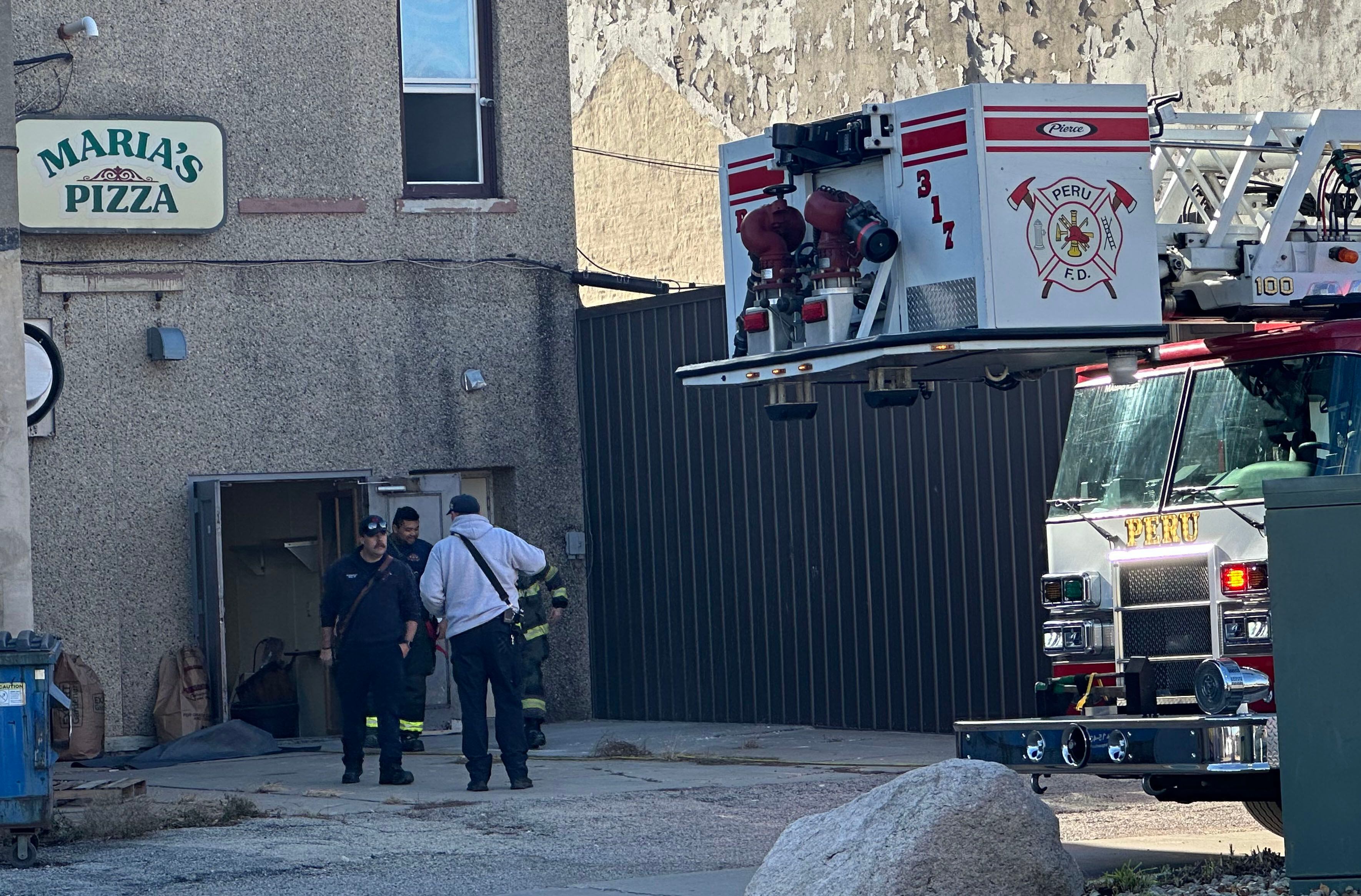 Photos: Peru fire called to former downtown business