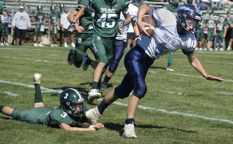 Bureau Valley’s Brock Shane breaks away from a tackle attempt by St Bede’s Hunter Savage during the first quarter Saturday, Oct. 1, 2022 at St Bede.