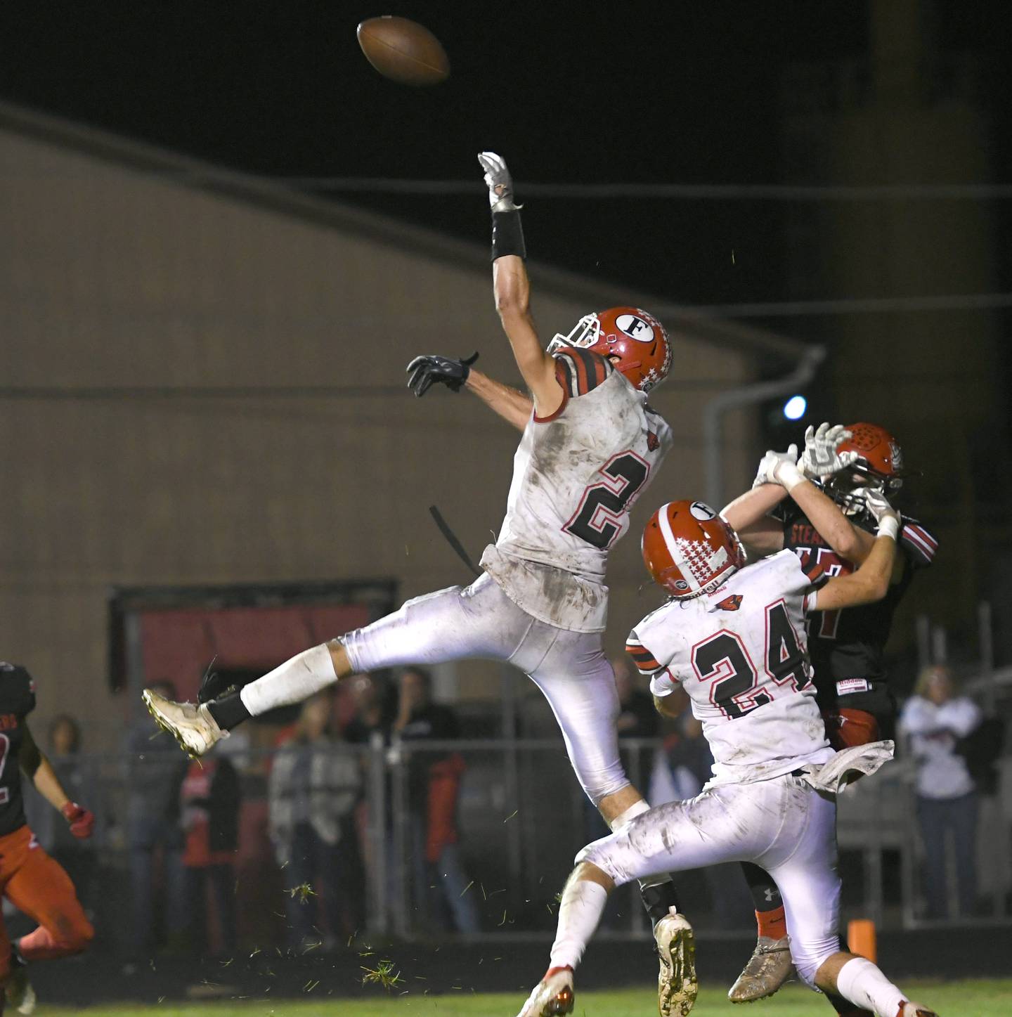 Forreston's Matthew Betran deflects a pass in the endzone that is then caught by Noah Johnson.