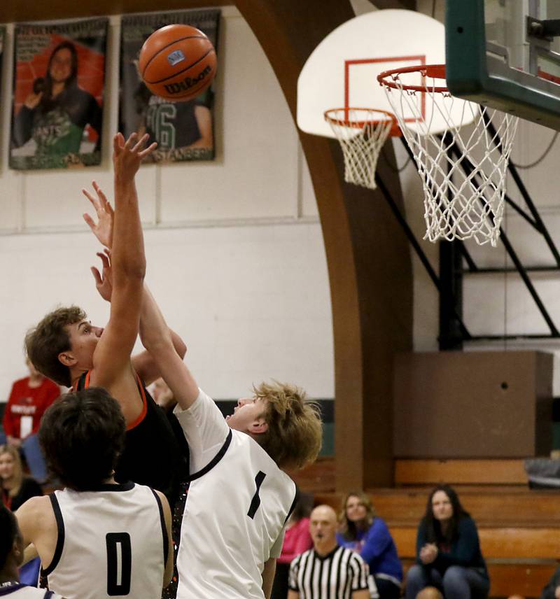 McHenry's Caleb Jett shoots the ball over Crystal Lake Central's JJ Parrish during the boy’s game of McHenry County Area All-Star Basketball Extravaganza on Sunday, April 13, 2025, at Alden-Hebron’s Tigard Gymnasium in Hebron.